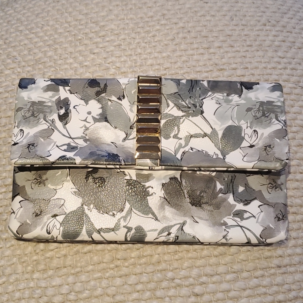 Grey and white floral clutch bag